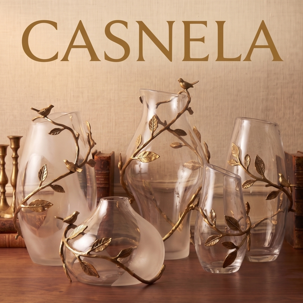 CASNELA bird and branch vase collection against linen background with candlesticks — CASNELA brand shot